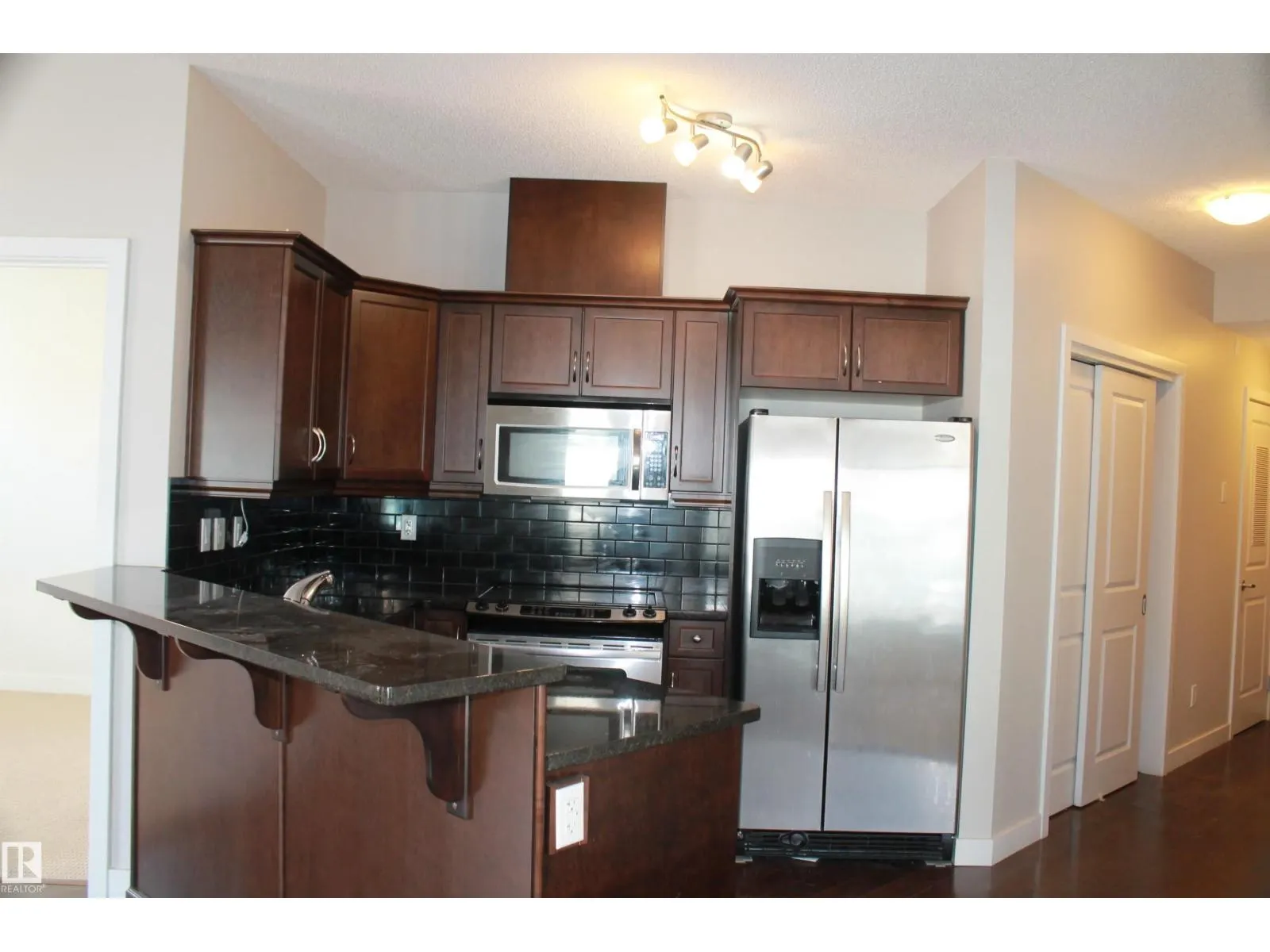 #103 7907 109 ST NW