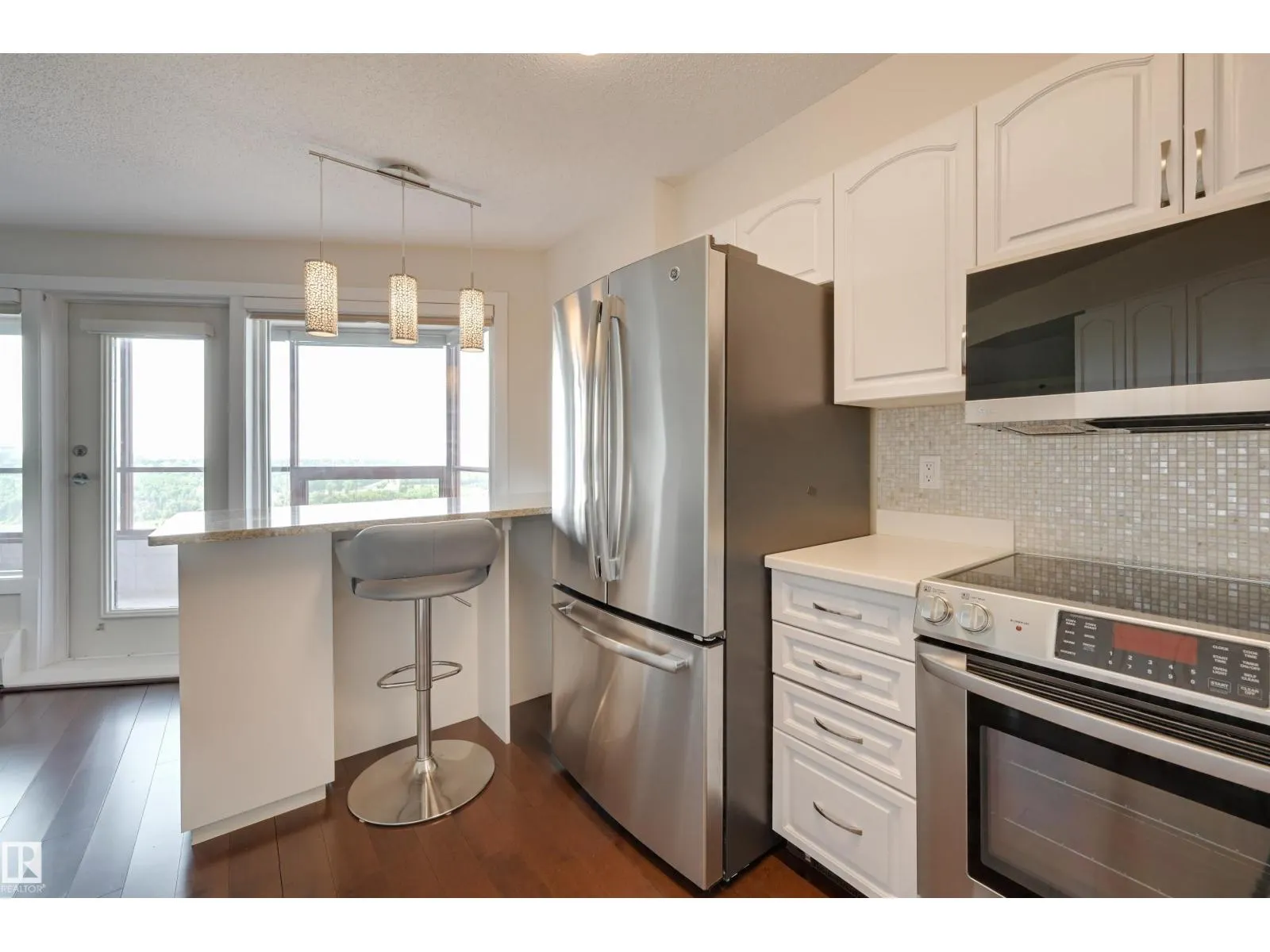 #1003 12319 JASPER AV NW