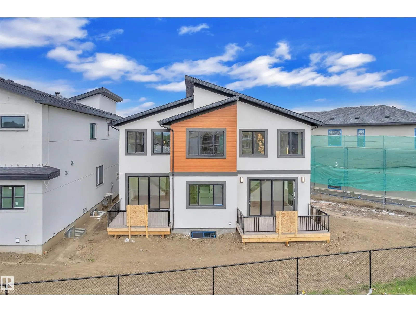 703 166 AV NE