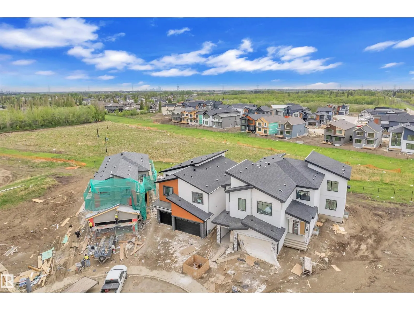 703 166 AV NE