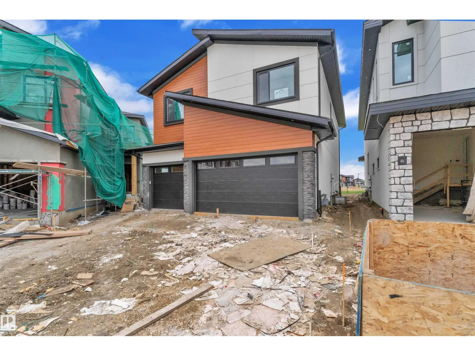 703 166 AV NE