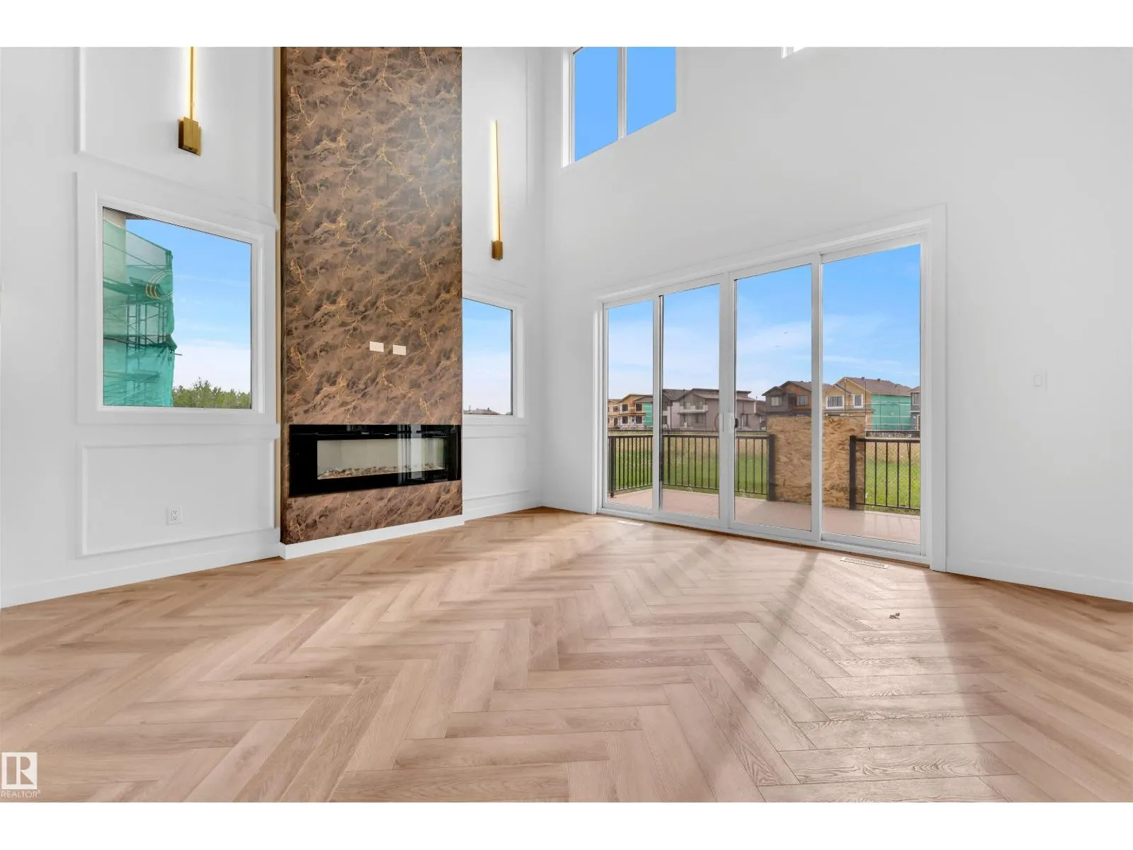 703 166 AV NE