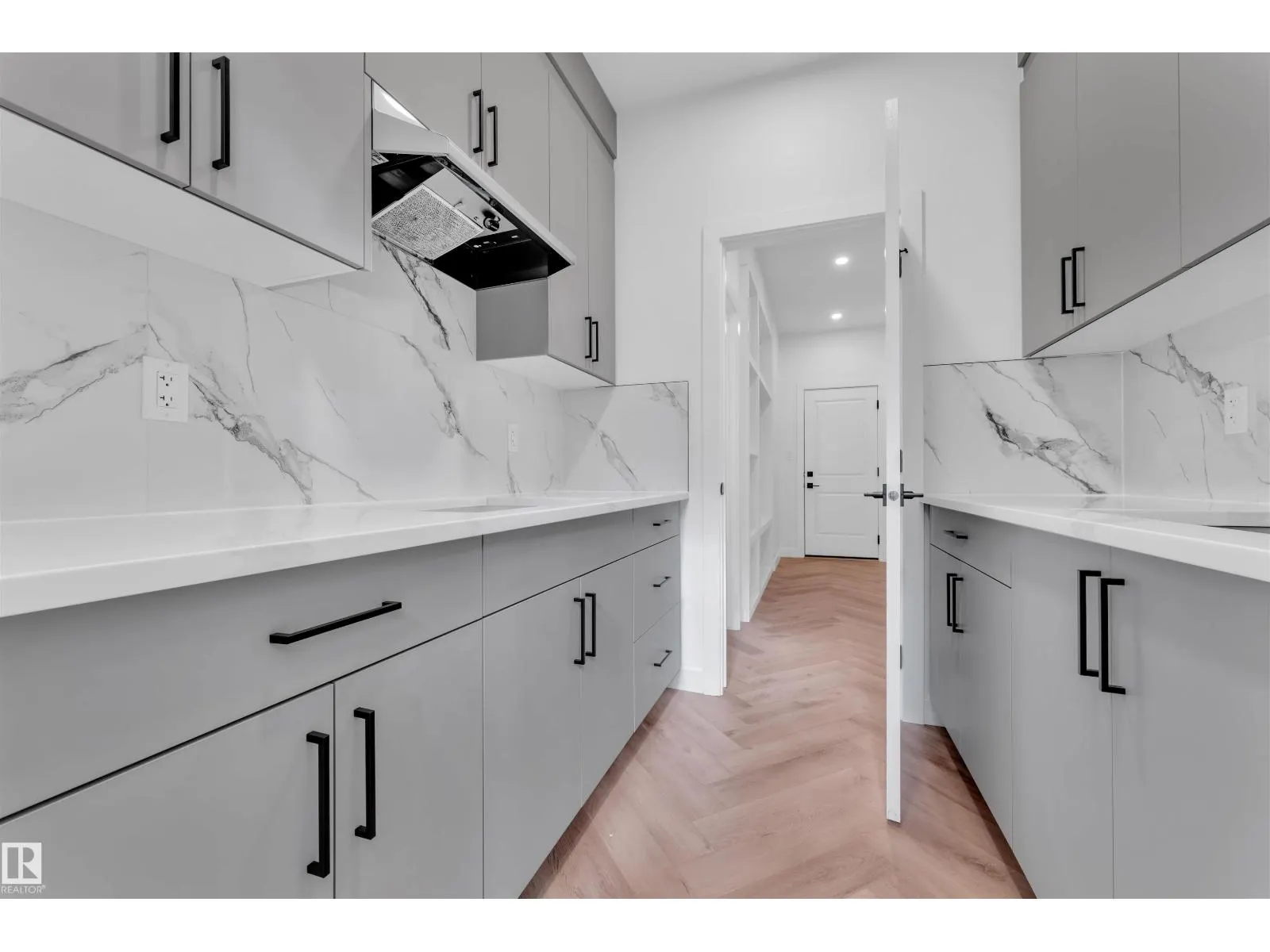 703 166 AV NE
