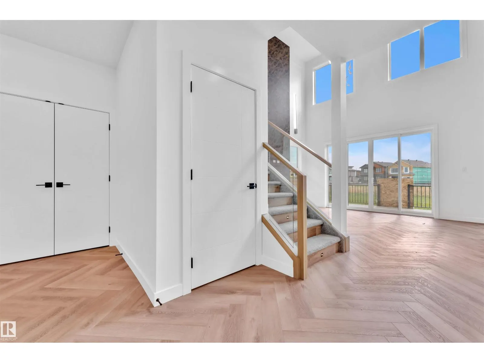 703 166 AV NE