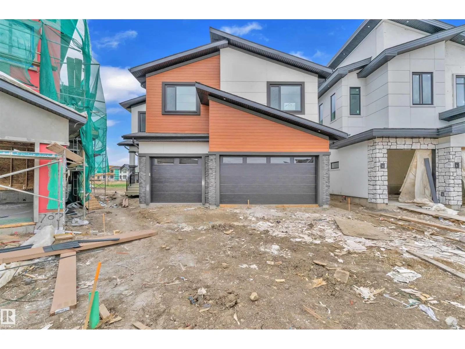 703 166 AV NE