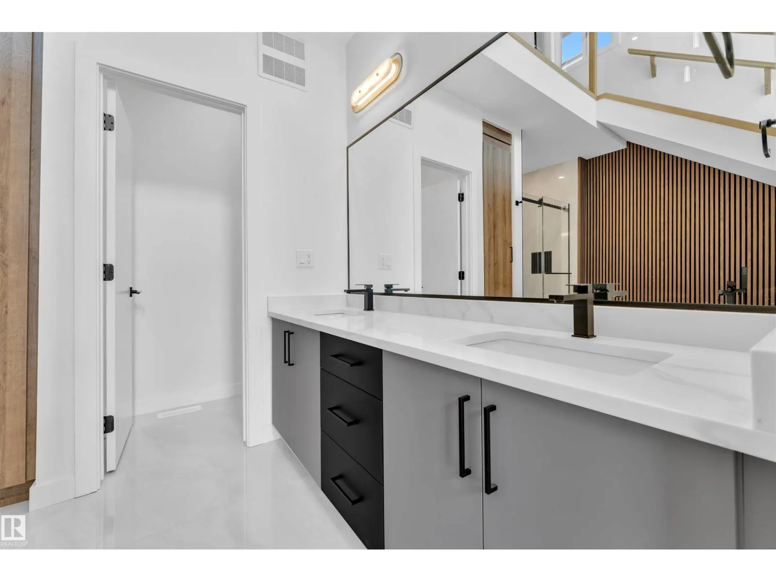 703 166 AV NE