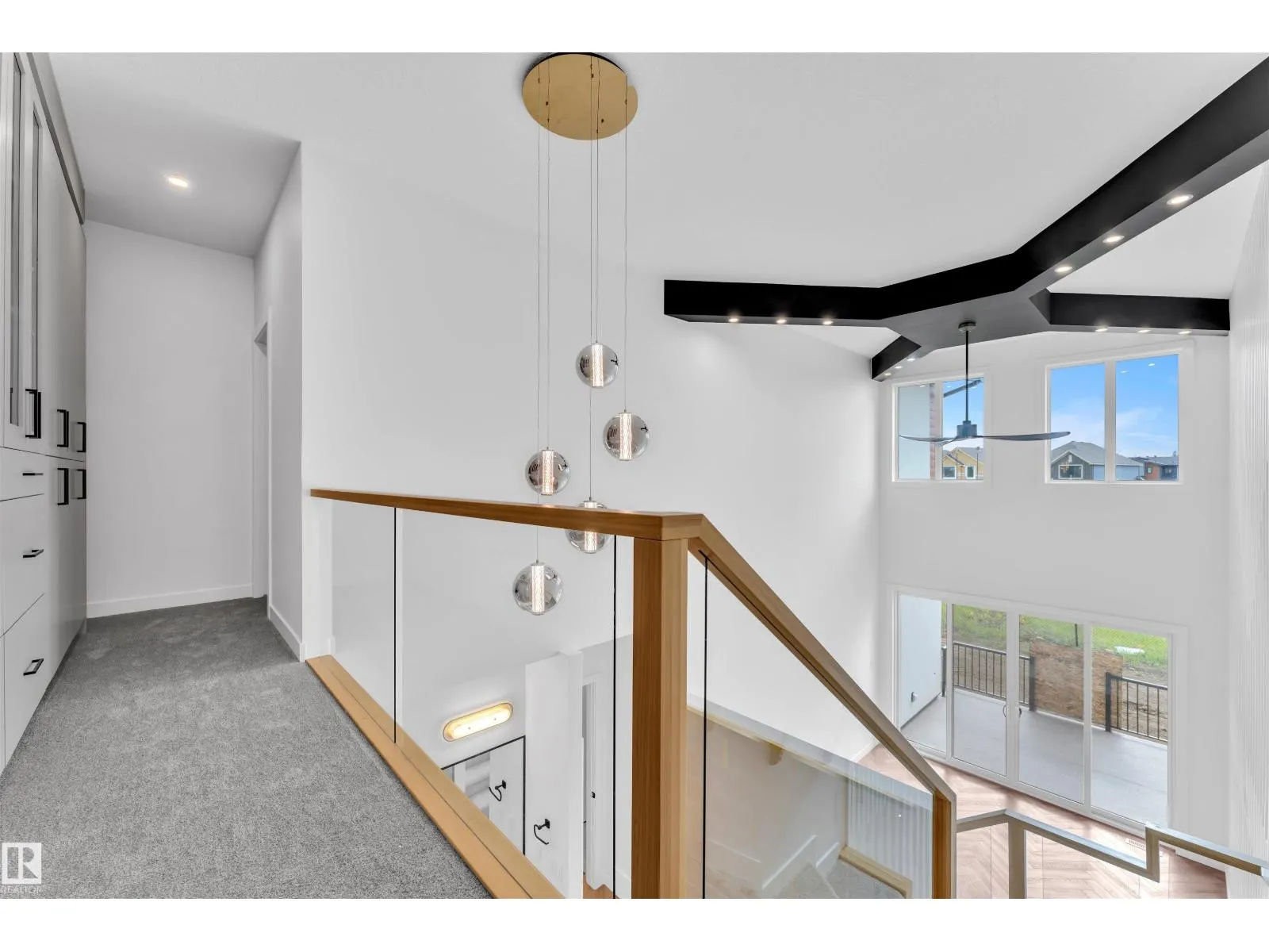 703 166 AV NE