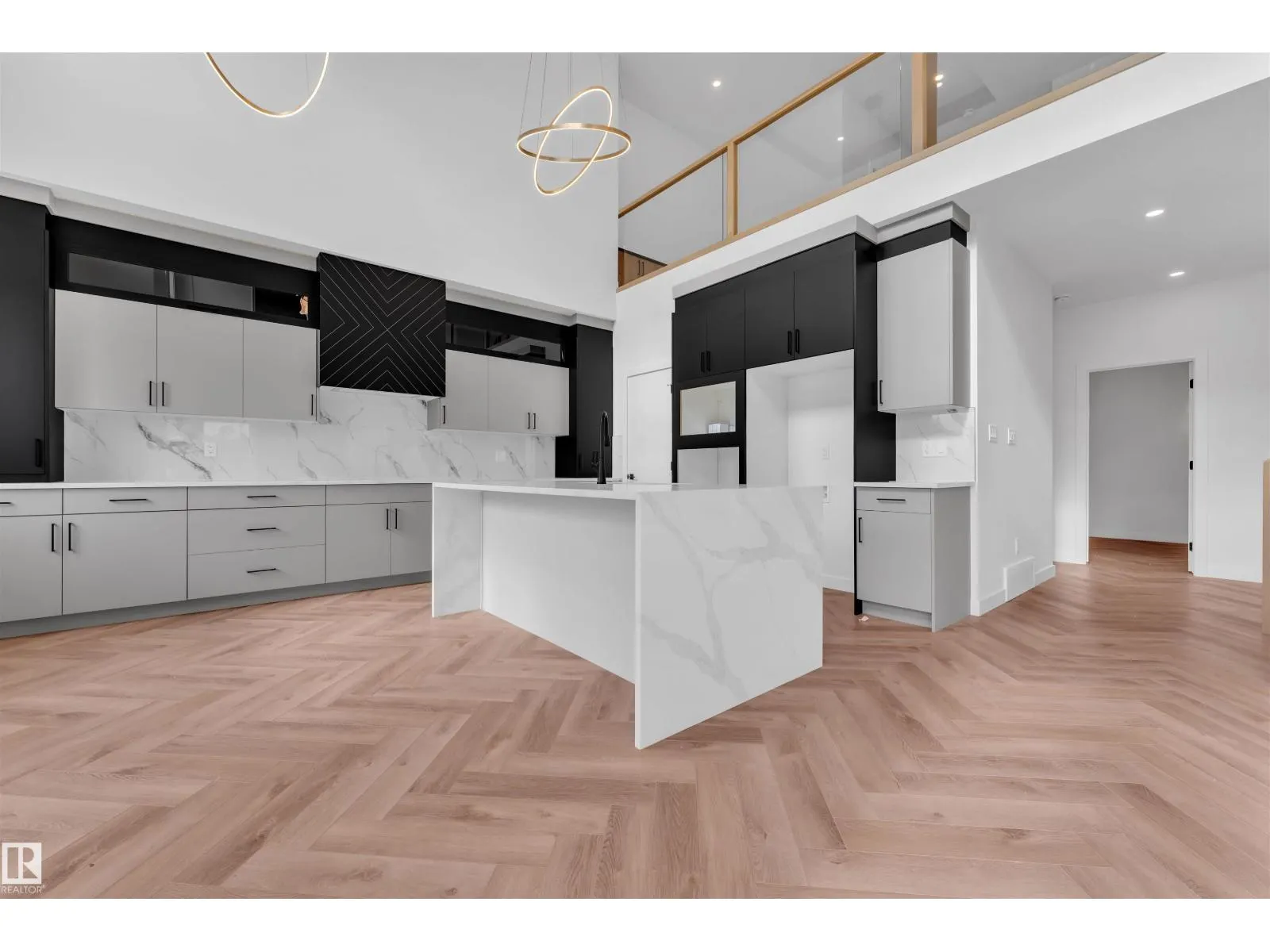 703 166 AV NE