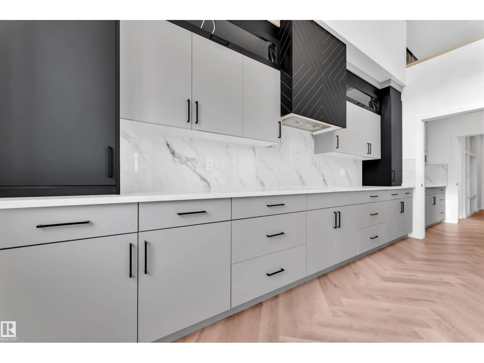 703 166 AV NE