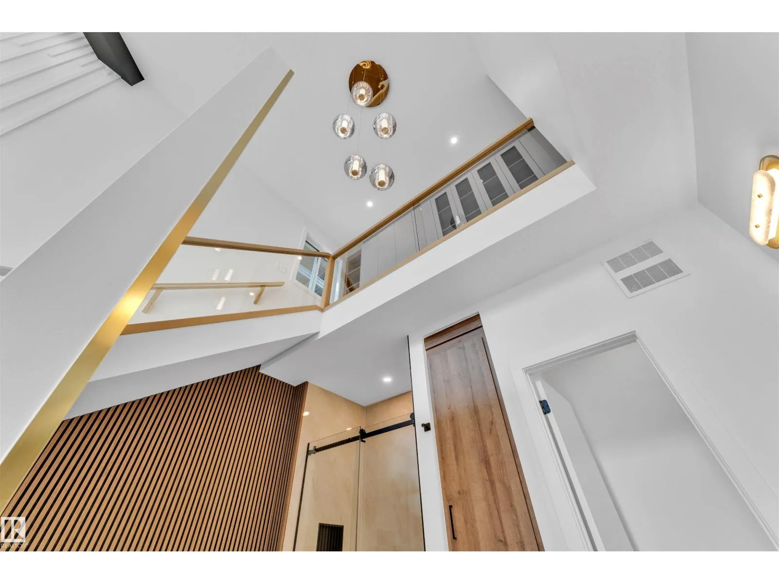 703 166 AV NE