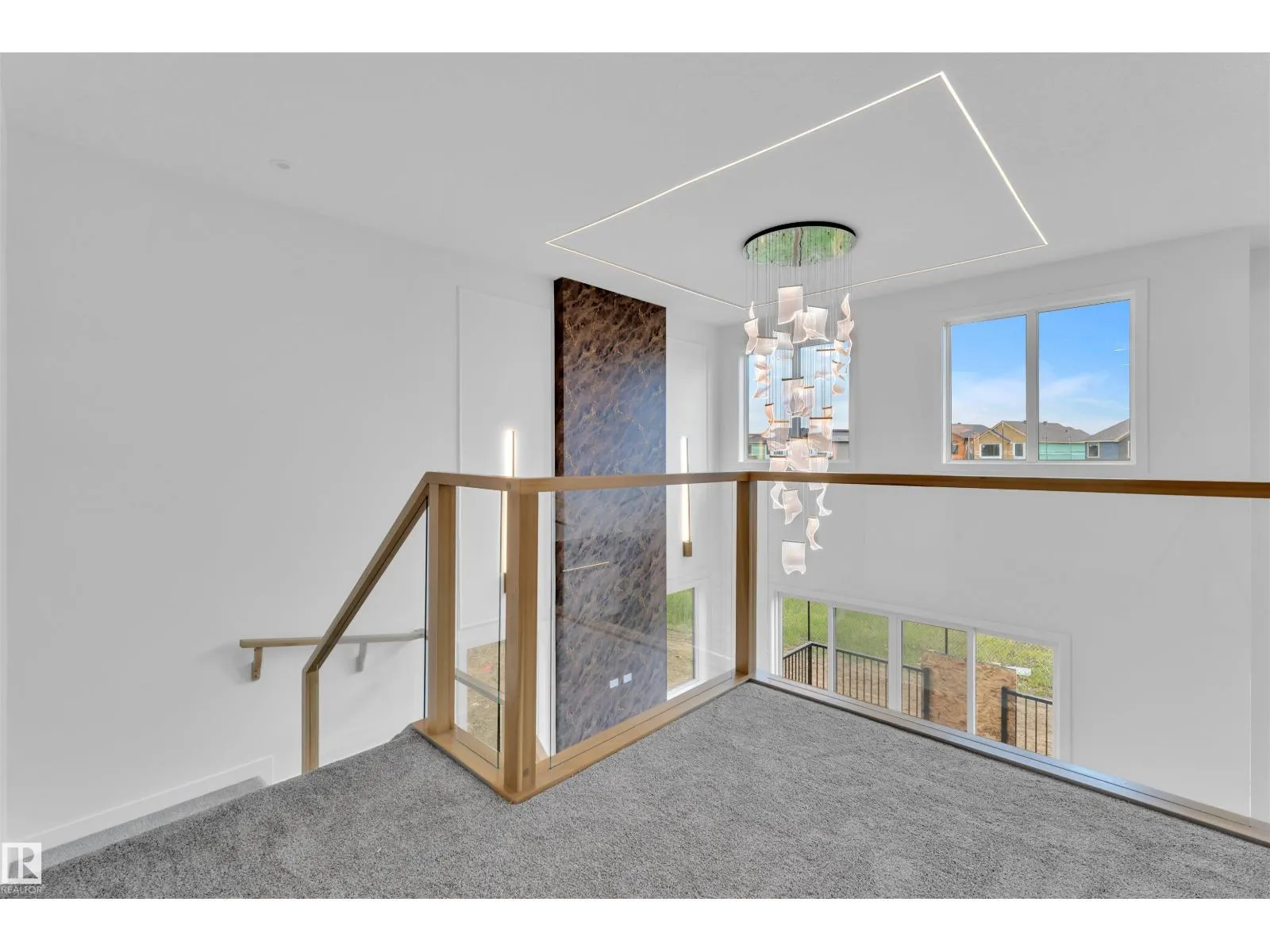 703 166 AV NE