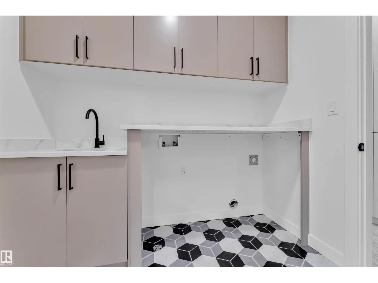 703 166 AV NE