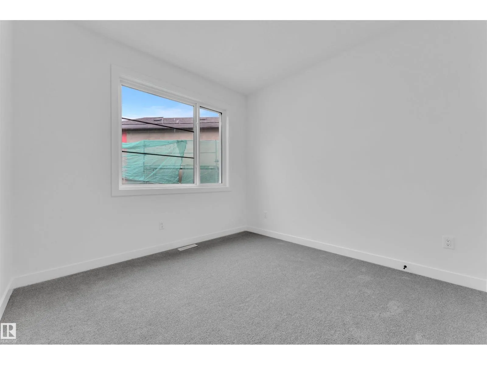 703 166 AV NE