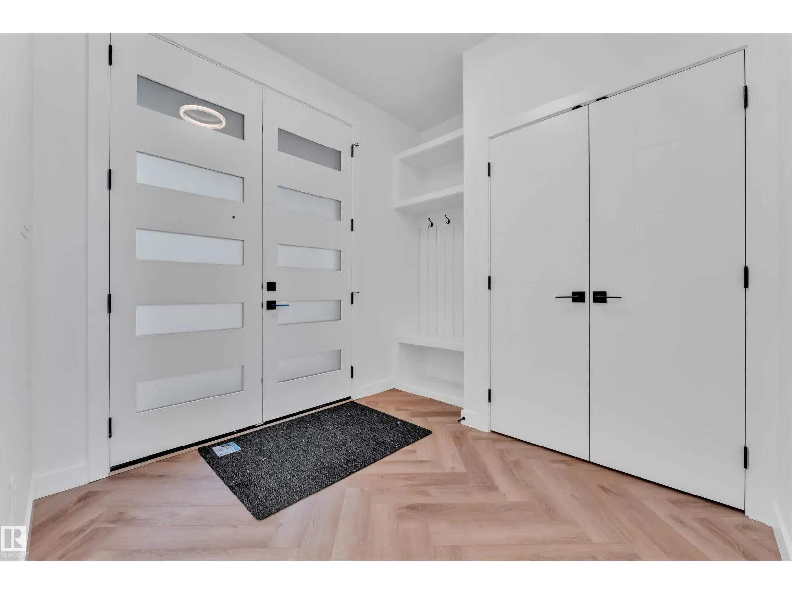 703 166 AV NE