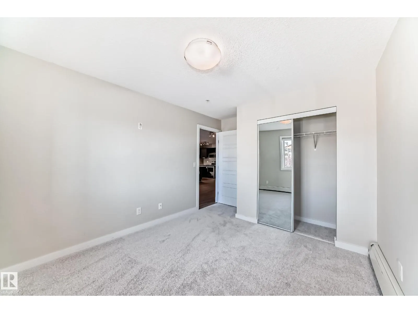 #220 14808 125 ST NW