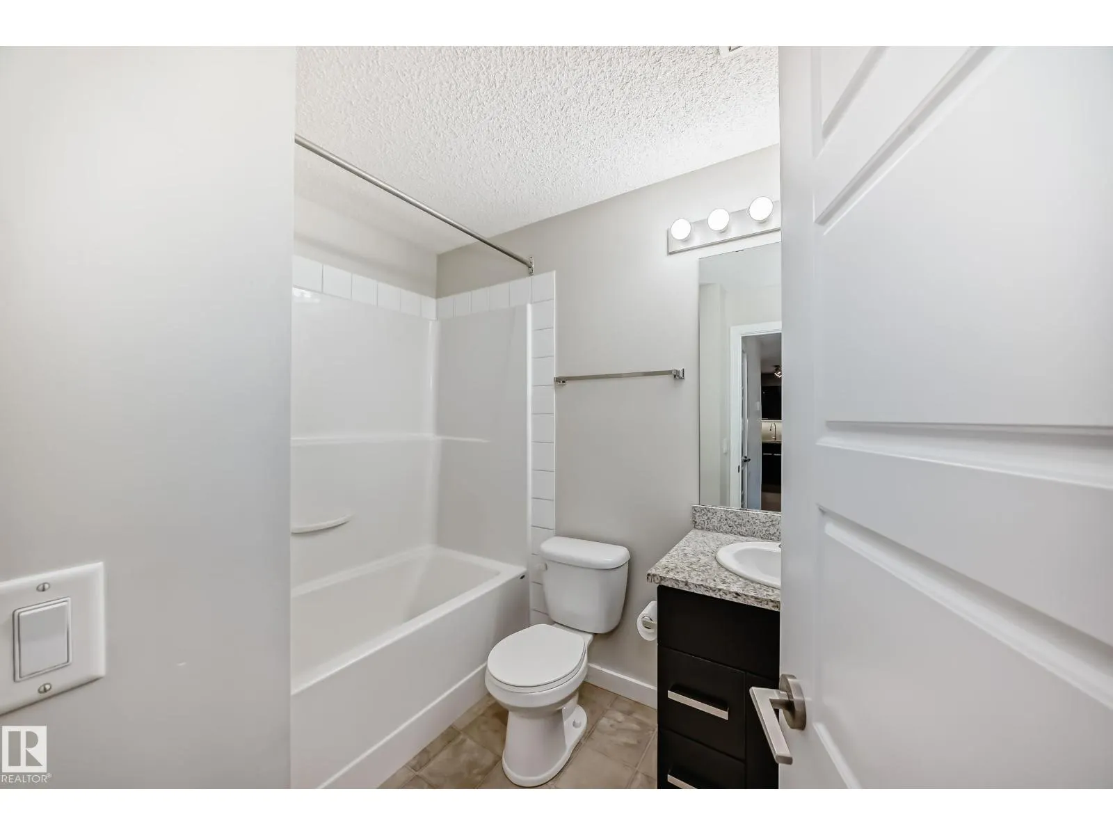 #220 14808 125 ST NW