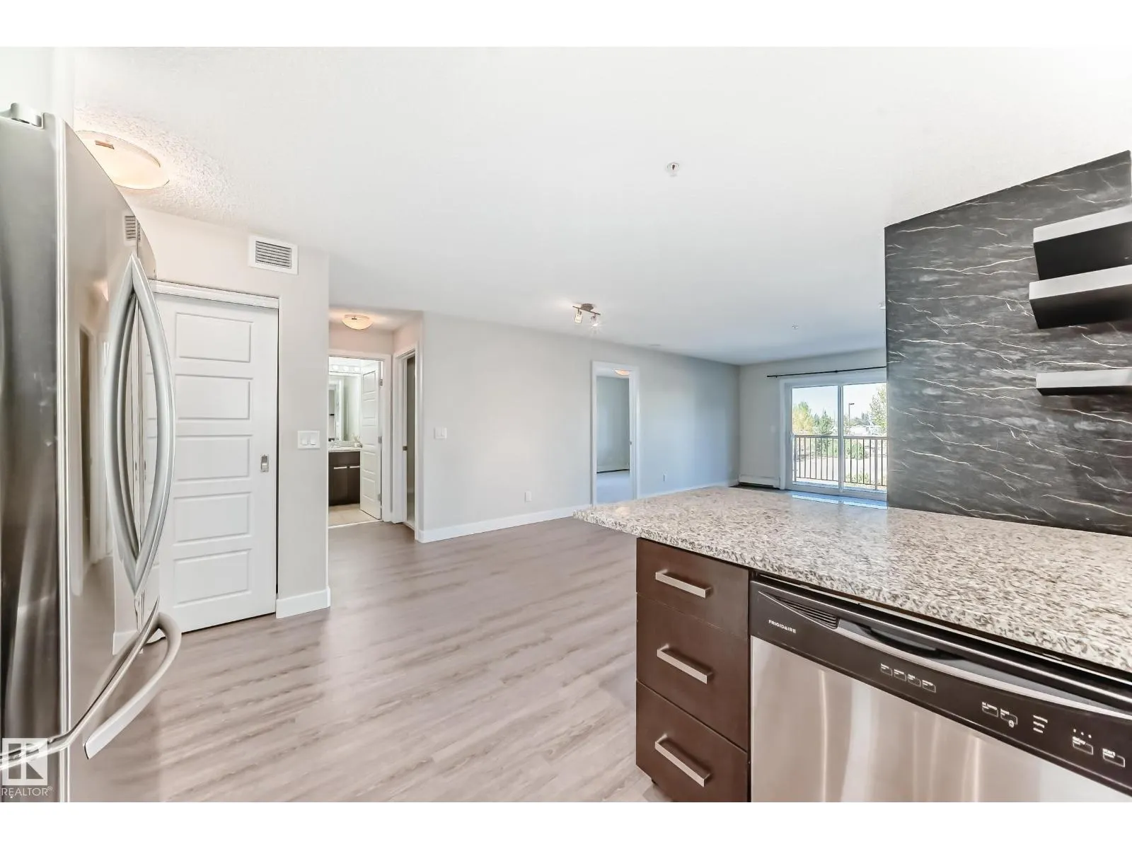 #220 14808 125 ST NW
