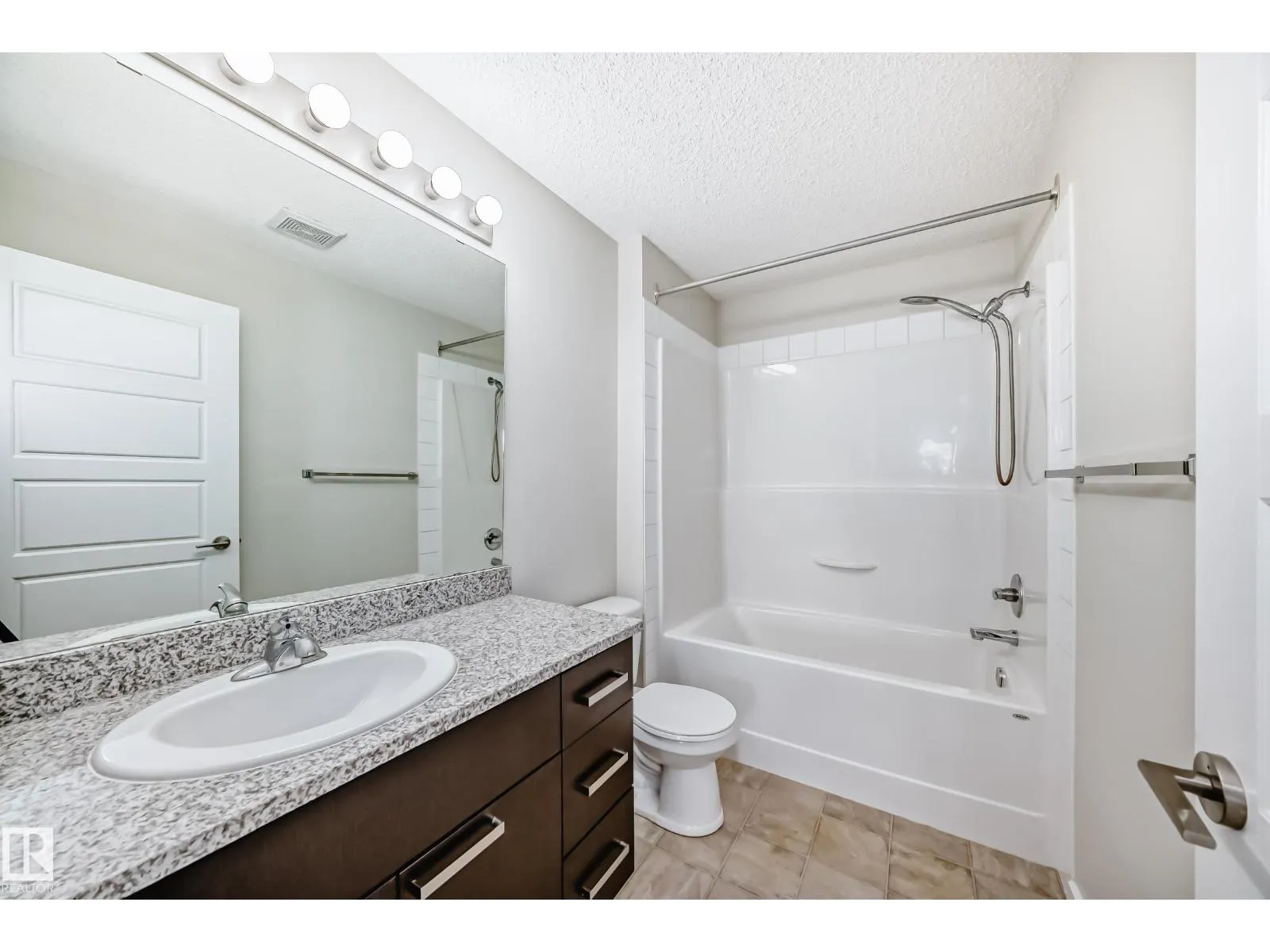 #220 14808 125 ST NW