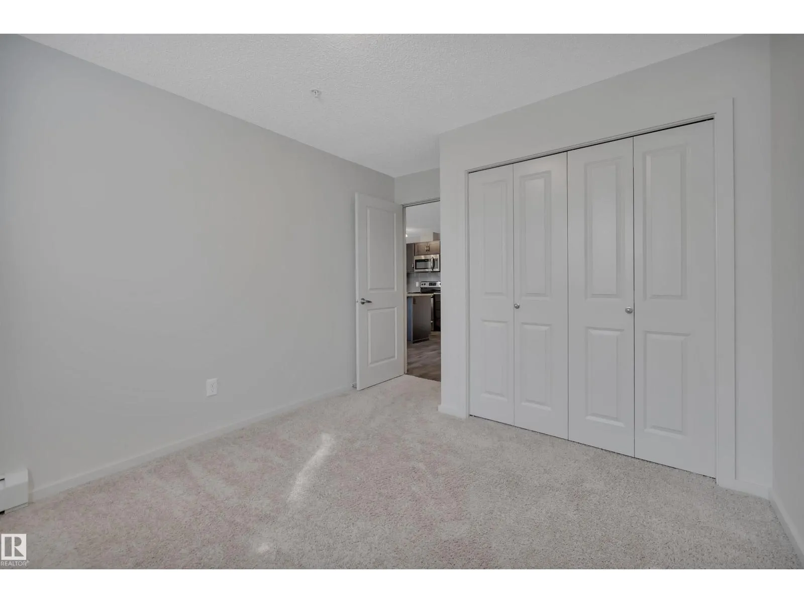 #114 7711 71 ST NW