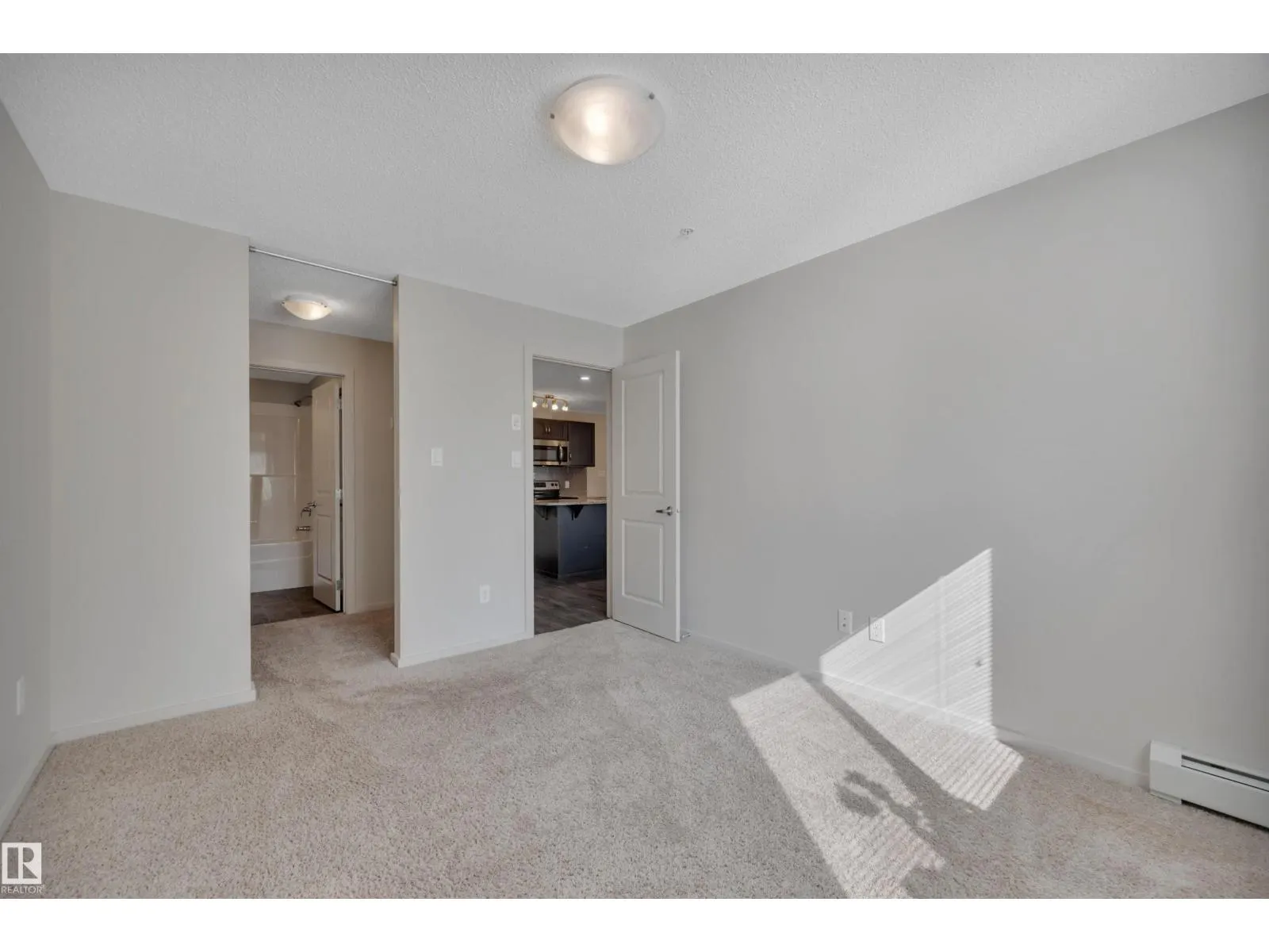 #114 7711 71 ST NW