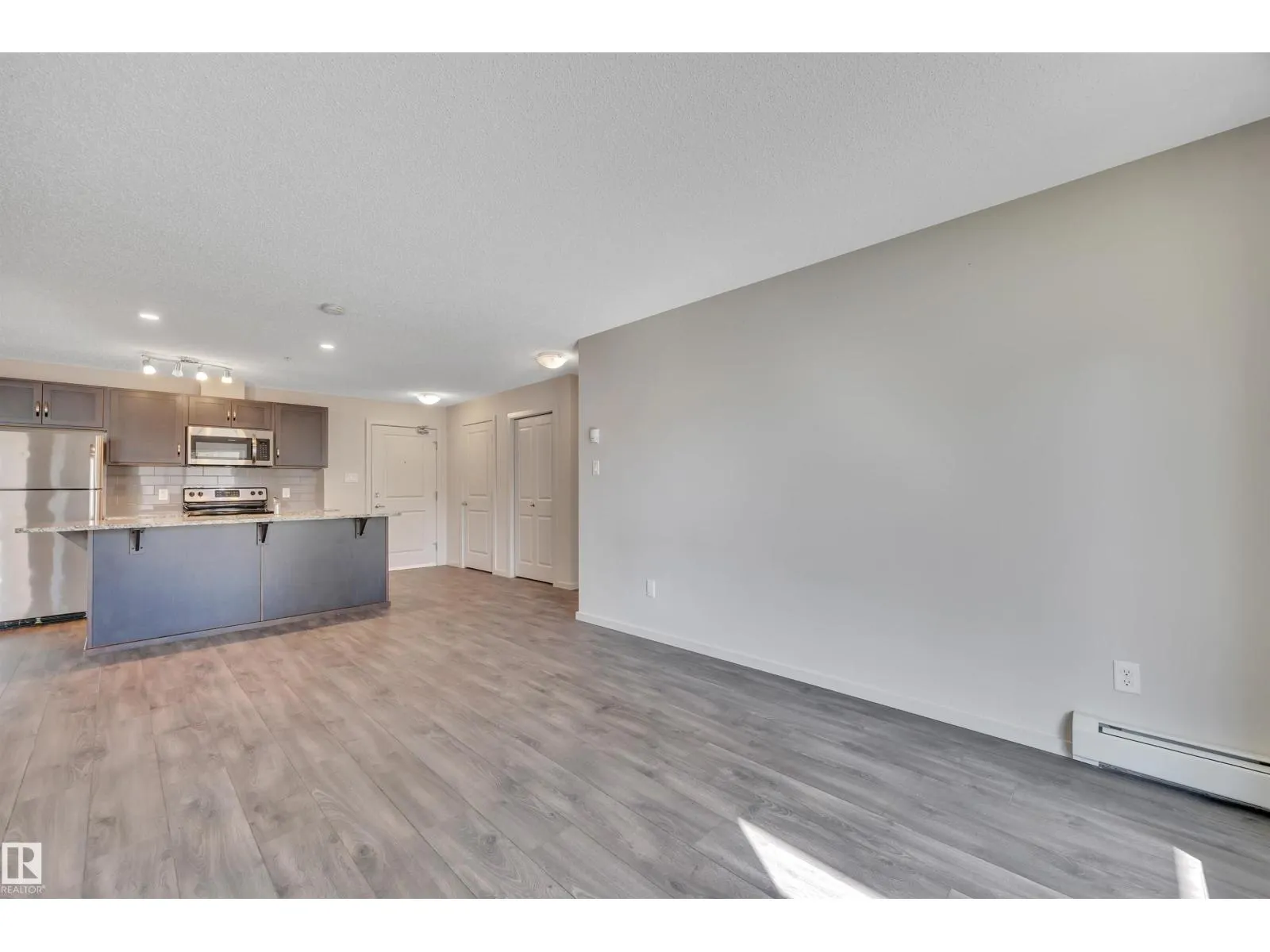 #114 7711 71 ST NW