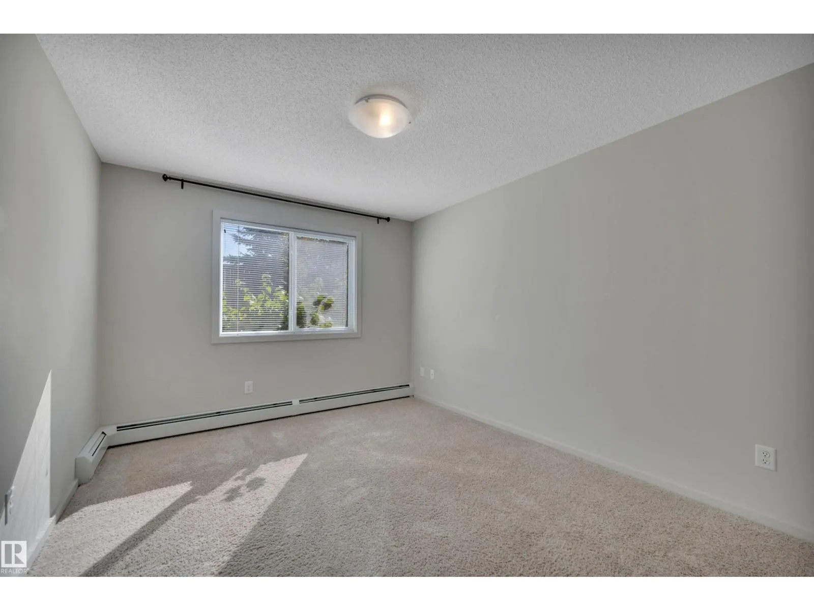 #114 7711 71 ST NW