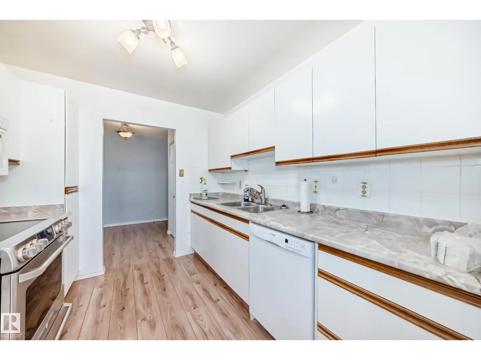 #416 5520 RIVERBEND RD NW