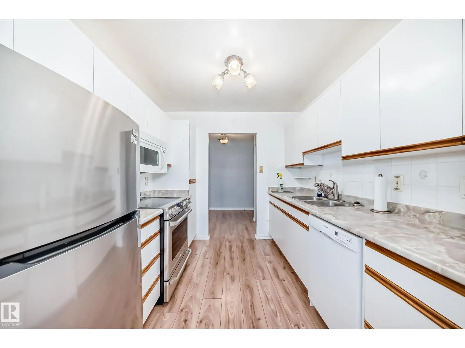 #416 5520 RIVERBEND RD NW