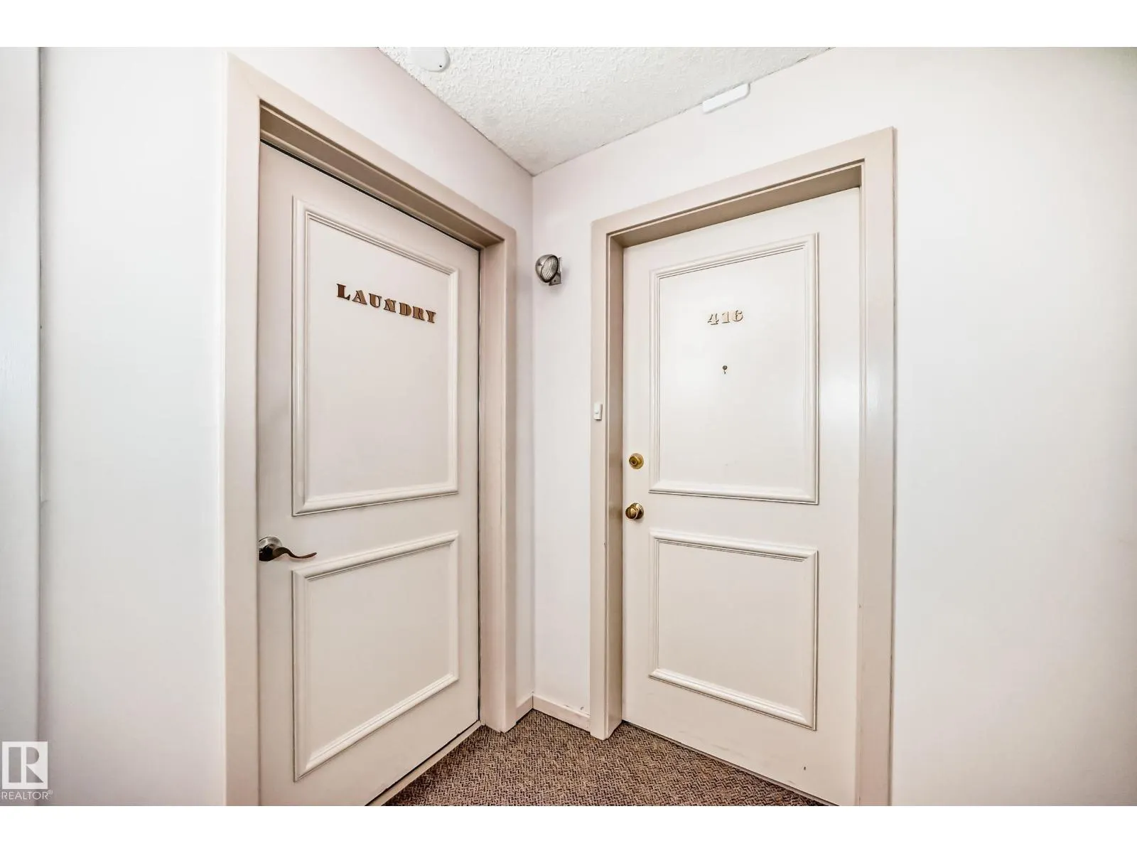#416 5520 RIVERBEND RD NW
