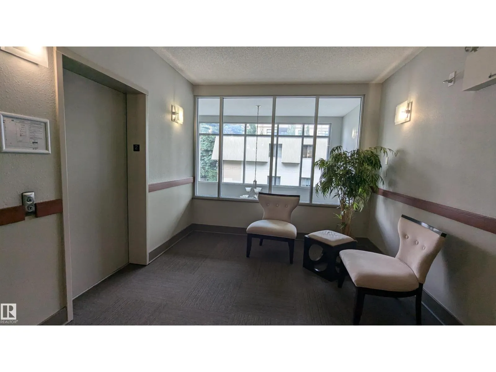 #203 11140 68 AV NW