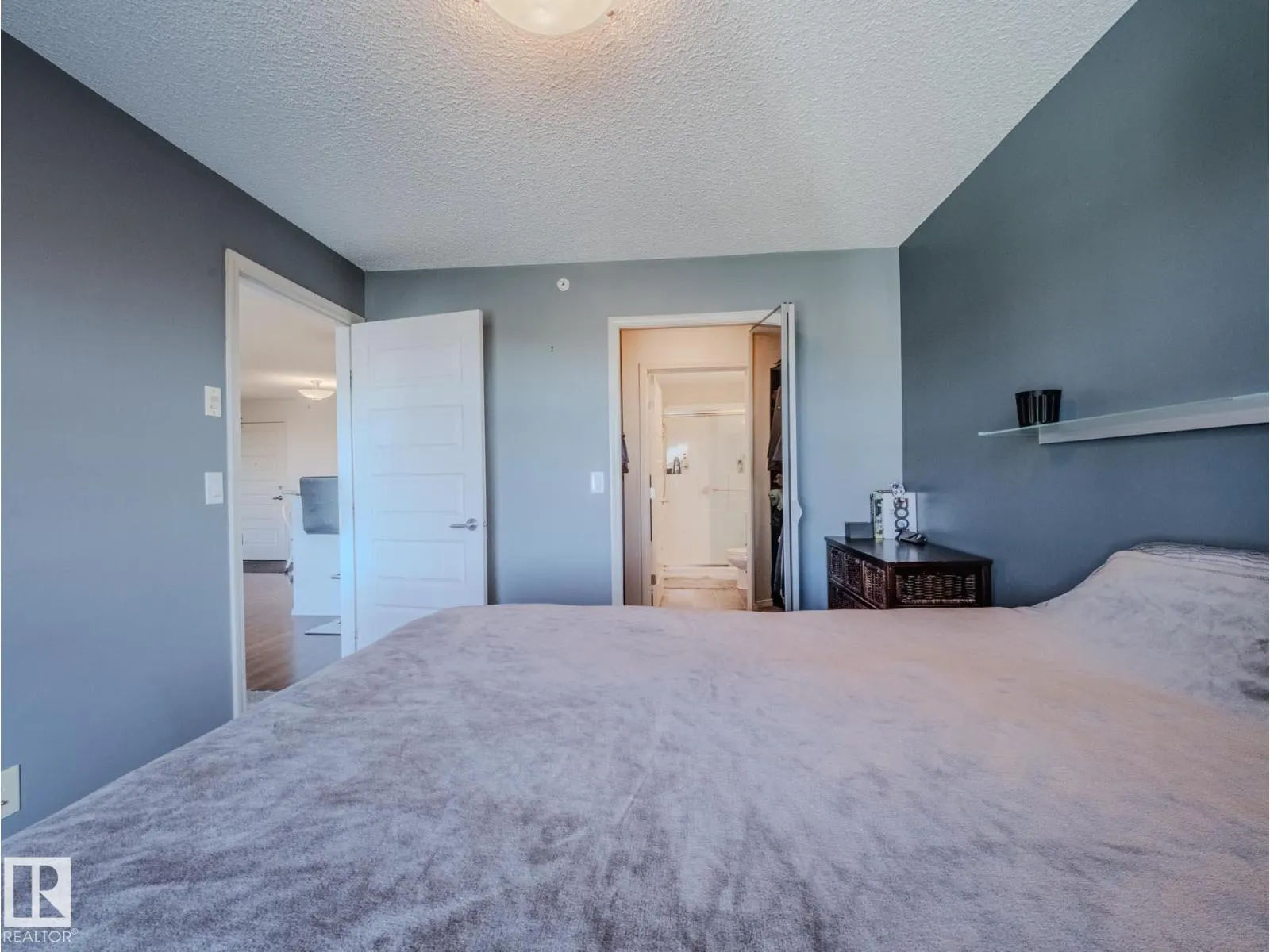 #409 6070 SCHONSEE WY NW