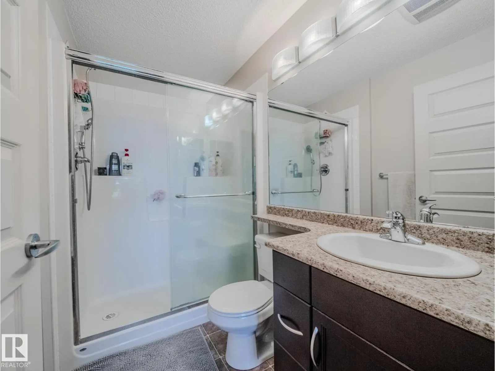 #409 6070 SCHONSEE WY NW
