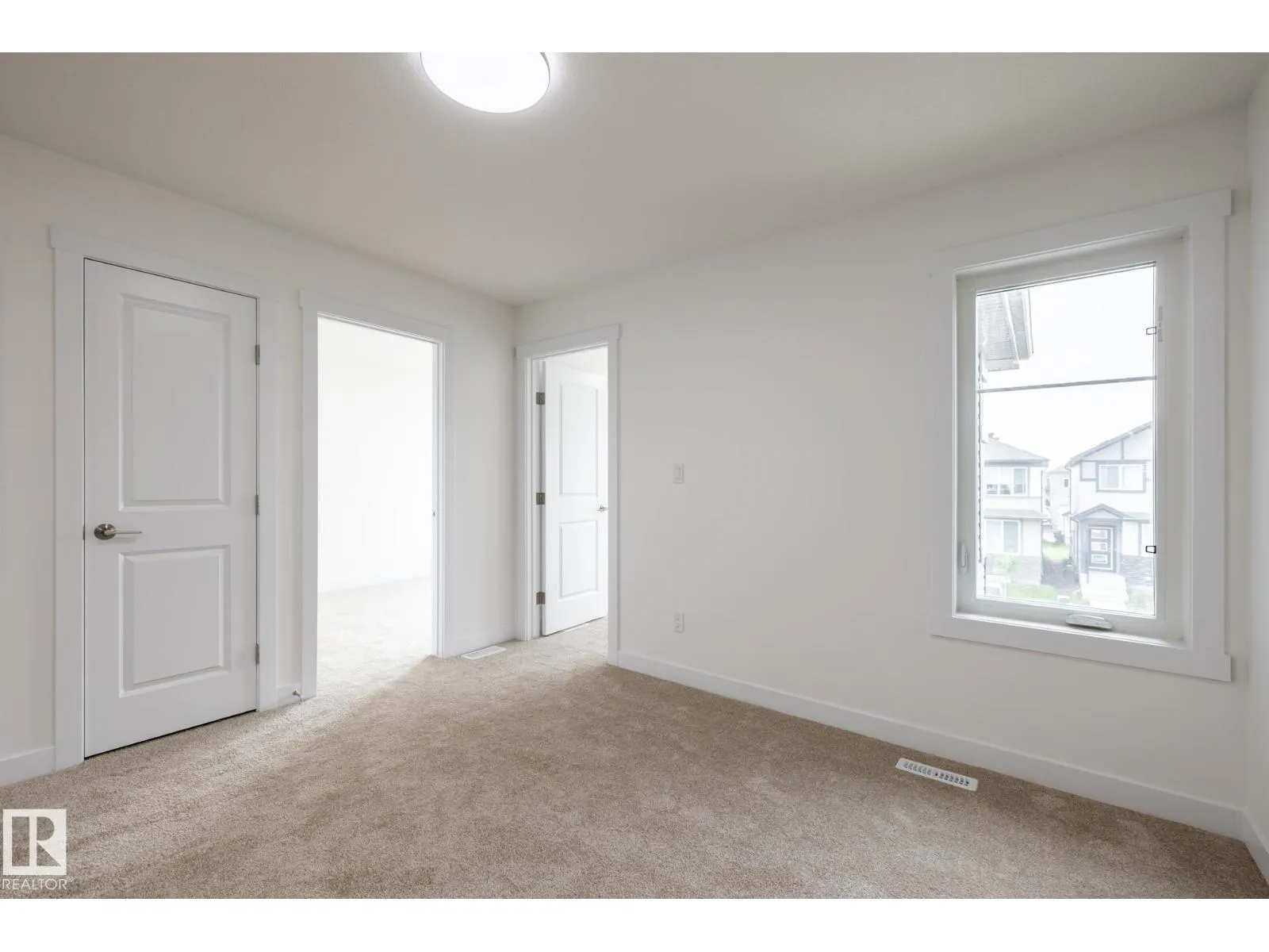 1933 209A ST NW