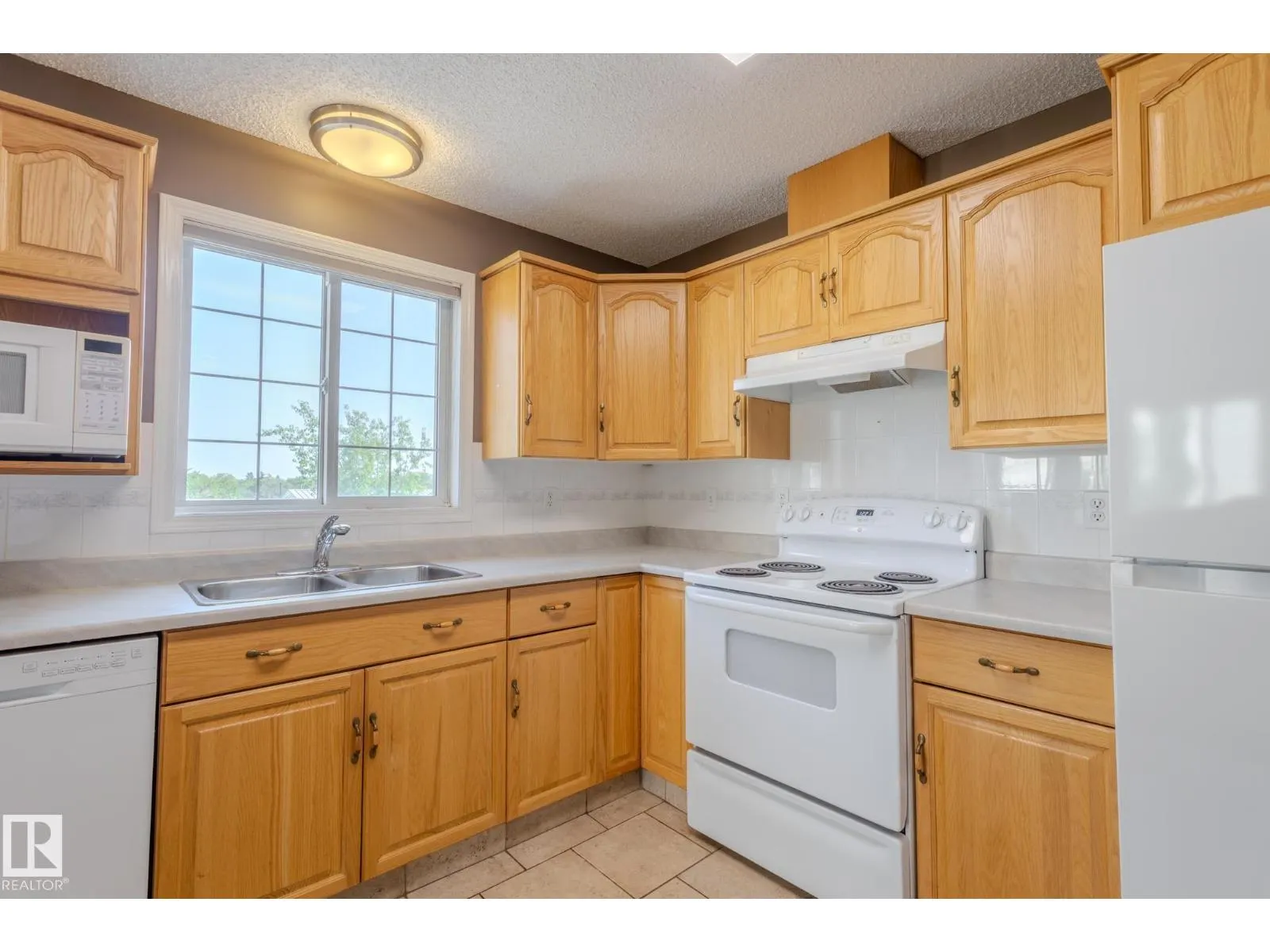#305 13450 114 AV NW