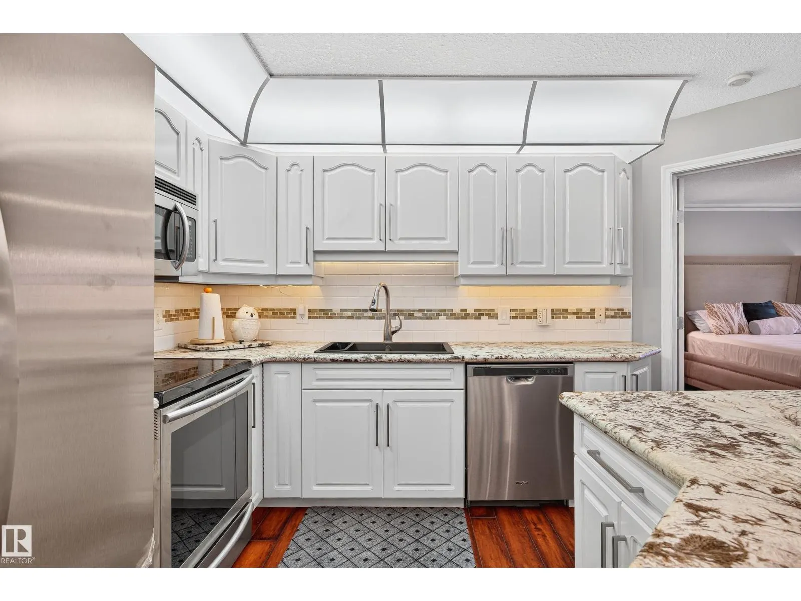 #101 10308 114 ST NW