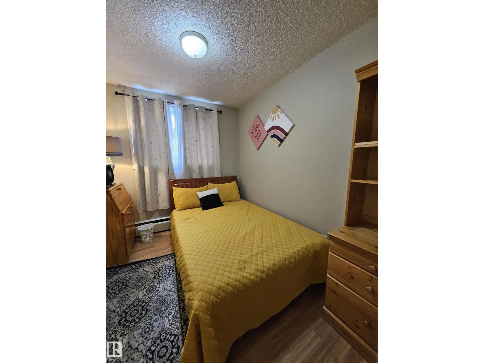 #102 12223 82 ST NW