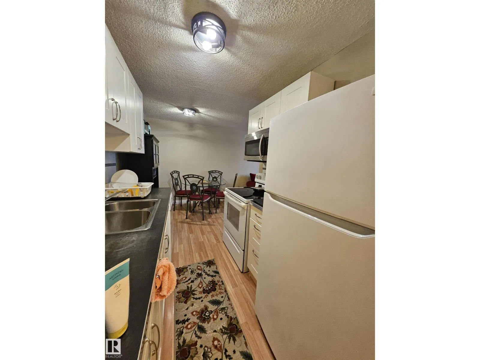 #102 12223 82 ST NW