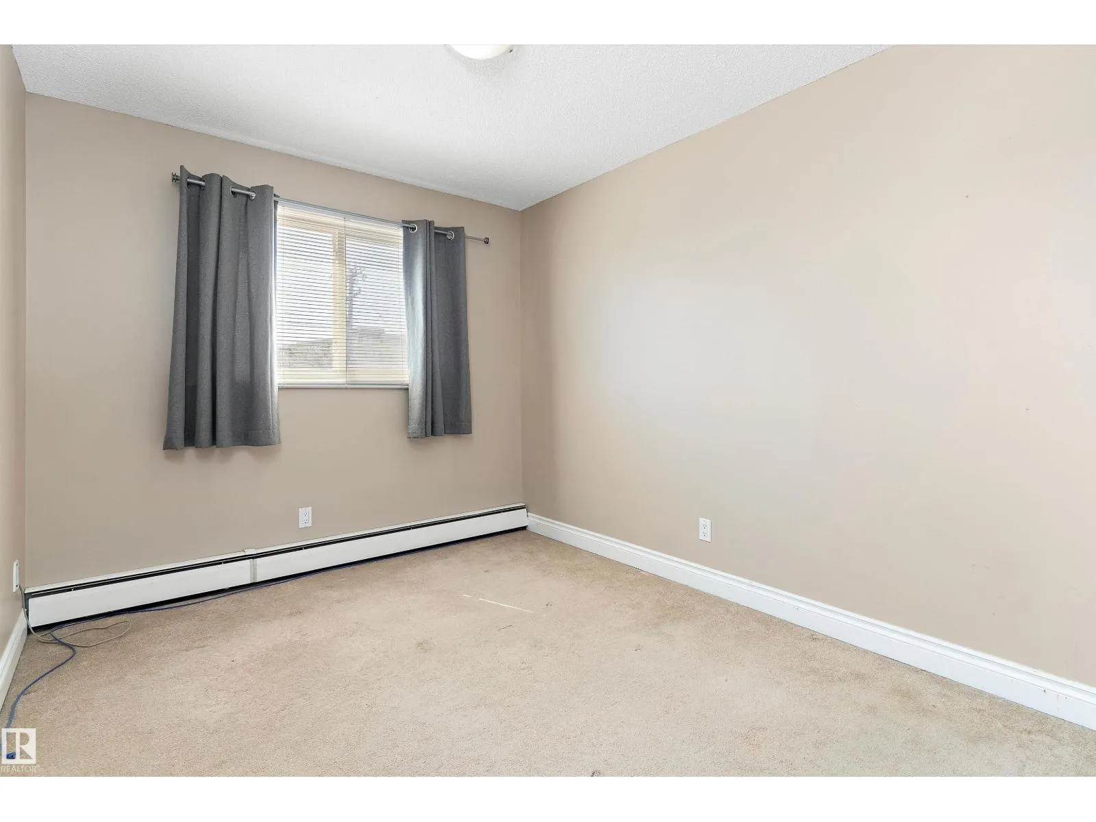 #303 10149 83 AV NW