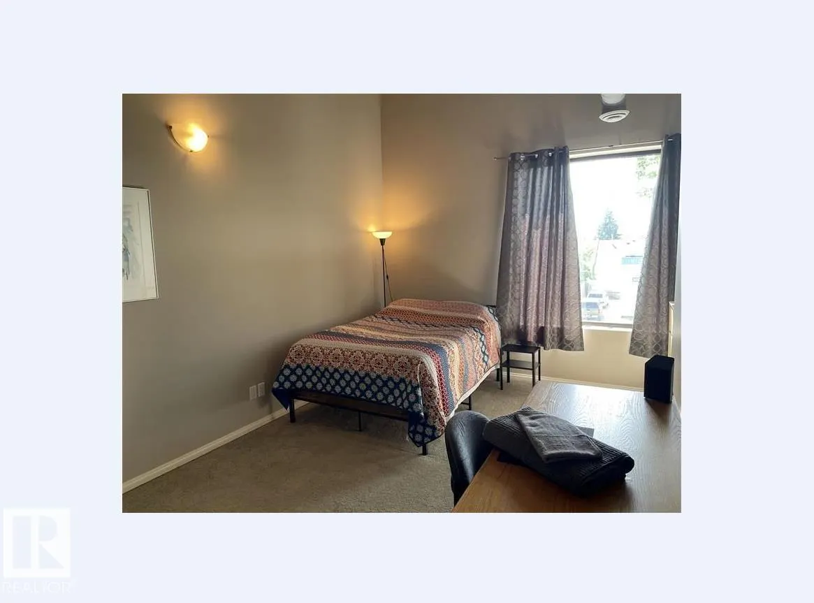 #211 9817 103 ST