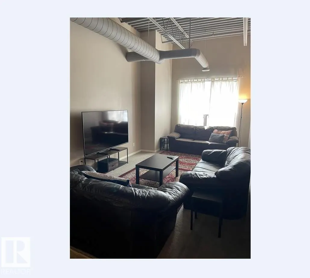 #211 9817 103 ST