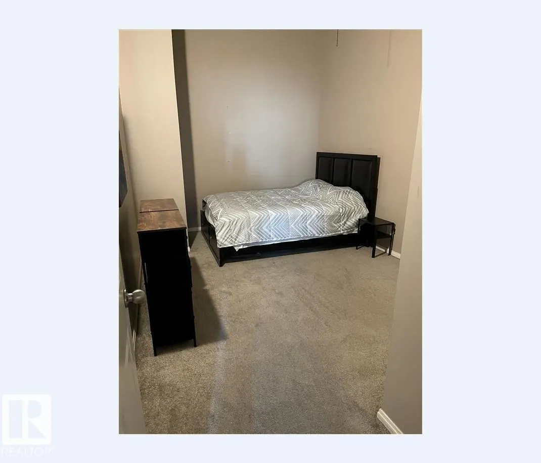 #211 9817 103 ST