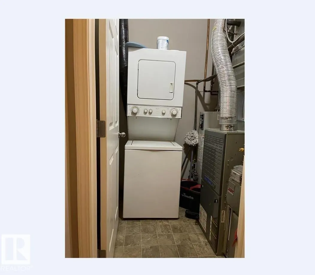#211 9817 103 ST