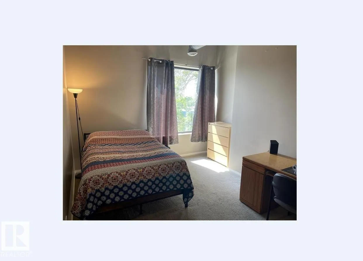 #211 9817 103 ST