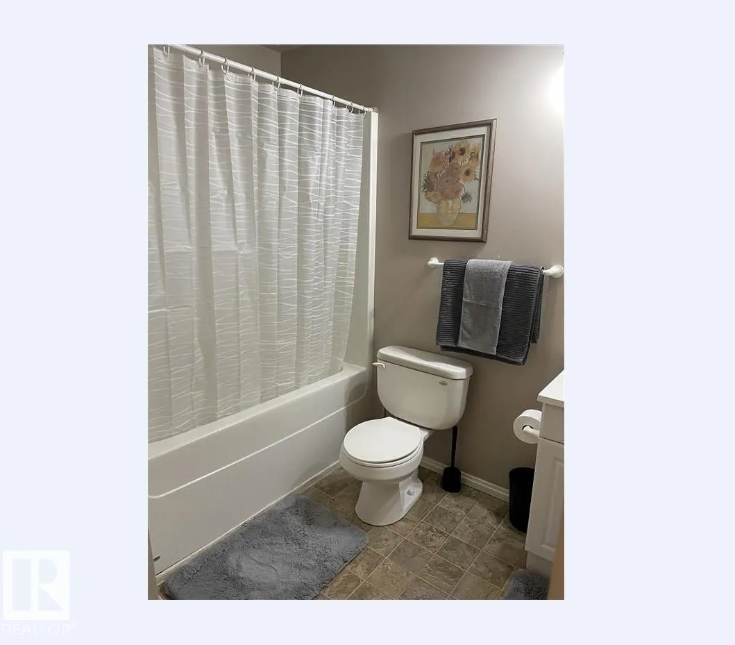 #211 9817 103 ST