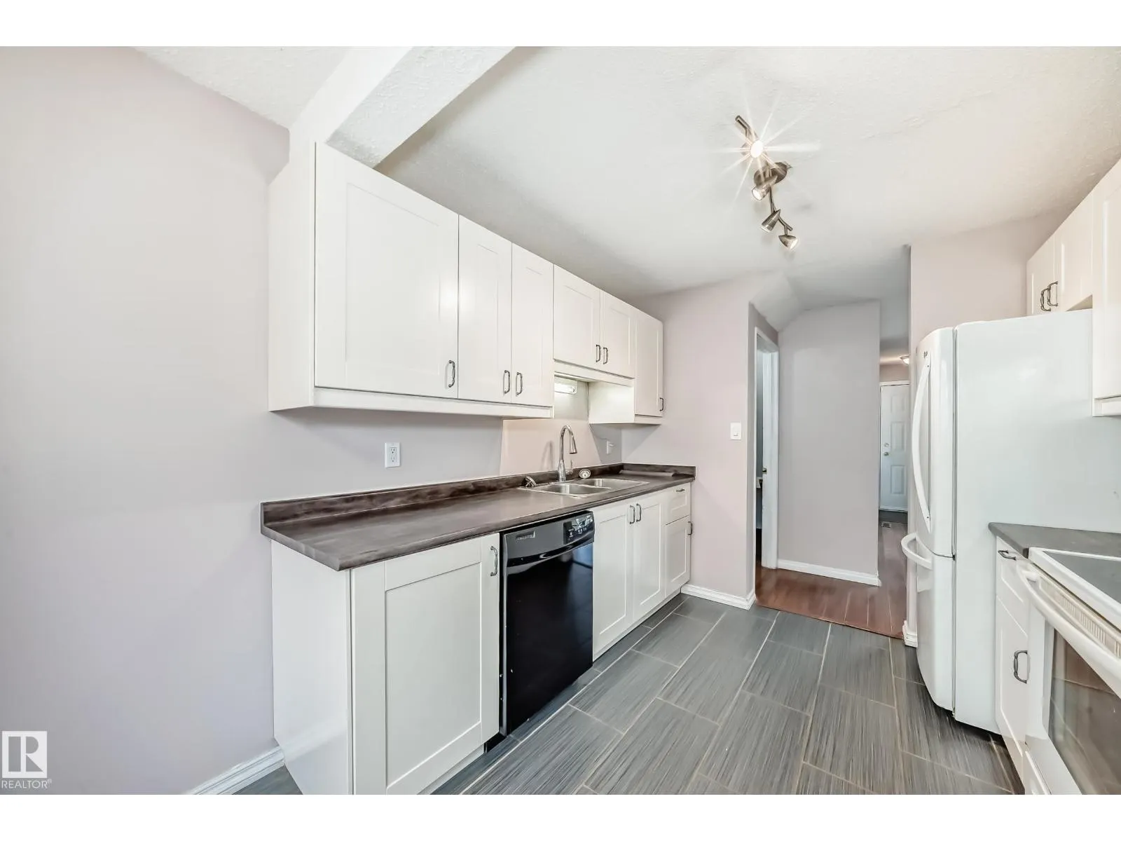 #24 1651 46 ST NW
