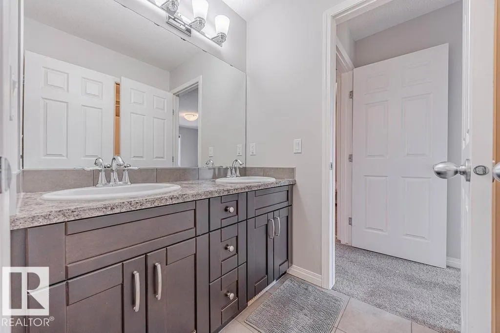 1019 COOPERS HAWK LI NW