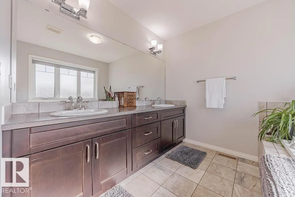 1019 COOPERS HAWK LI NW