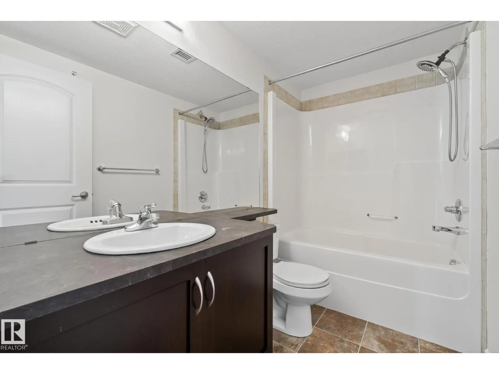 #407 12408 15 AV SW