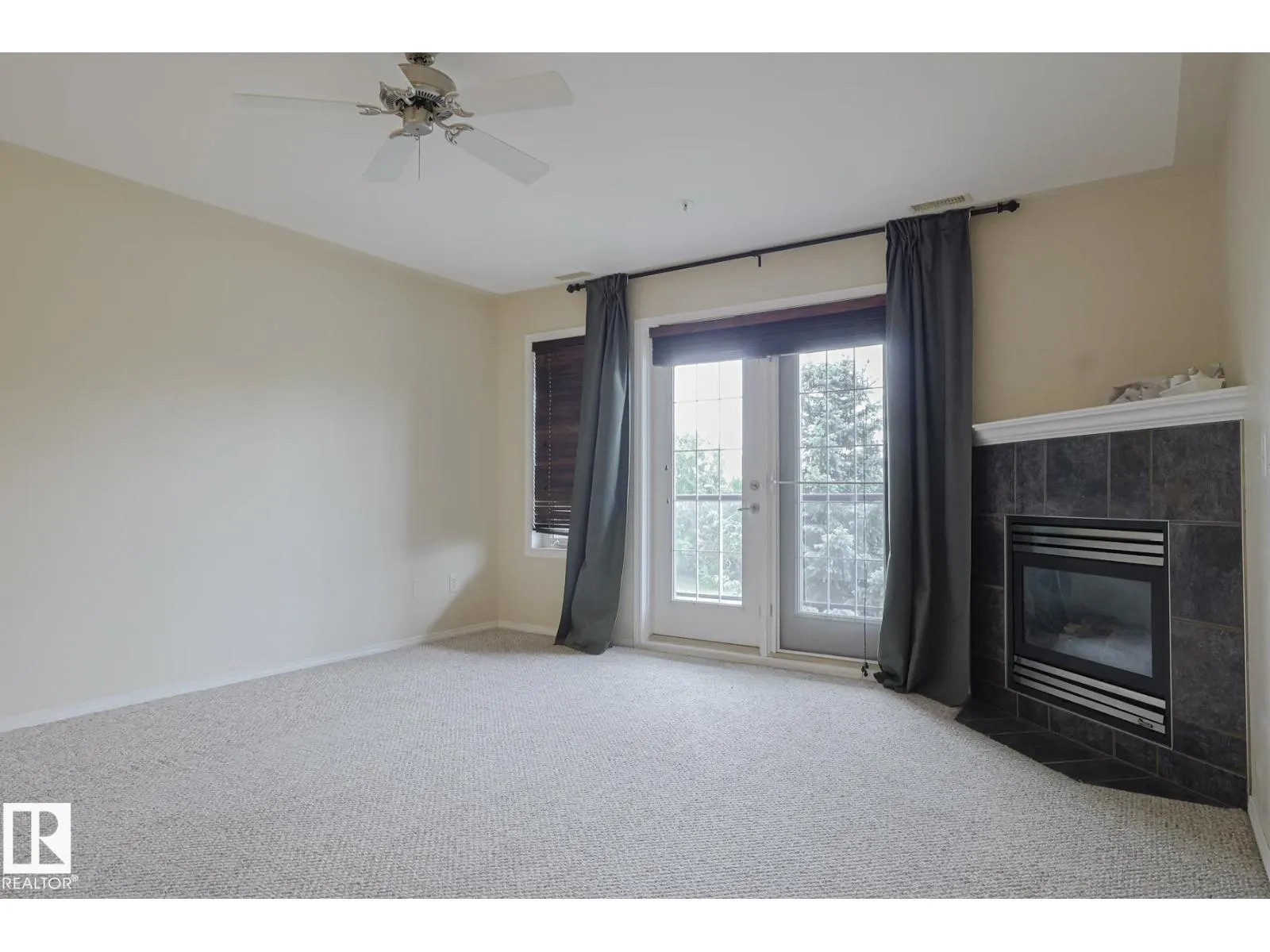 #409 261 Youville DR E NW