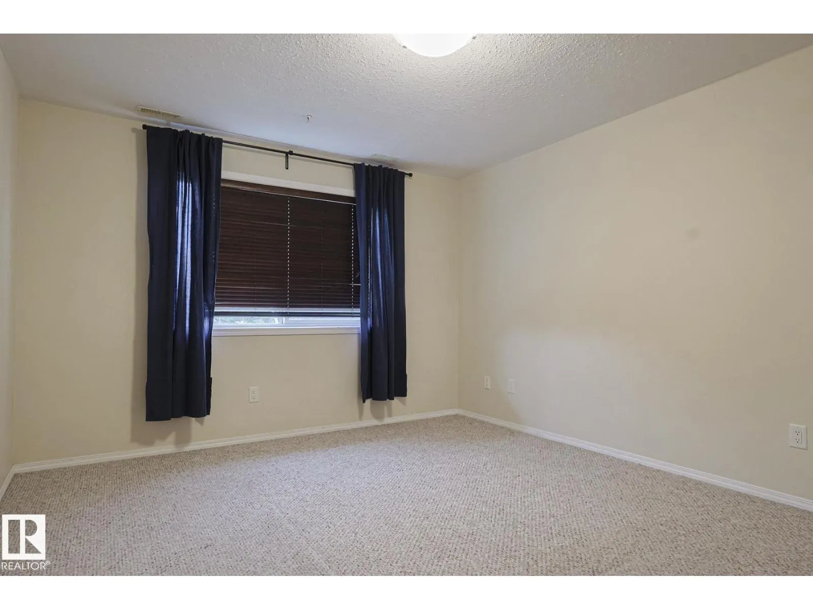 #409 261 Youville DR E NW